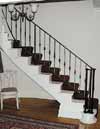 Classic staircase and balustrade handrails in wrought iron