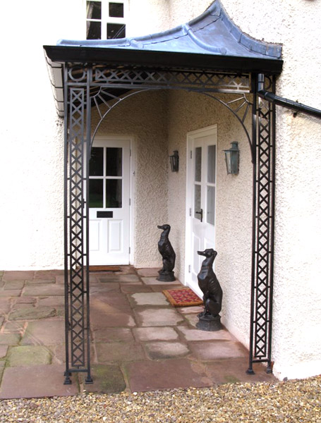 Metal porch with lead roof and galvanised mild steel support structure