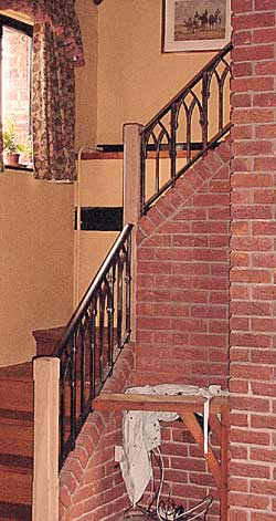 Gothic style wrought iron stair handrails