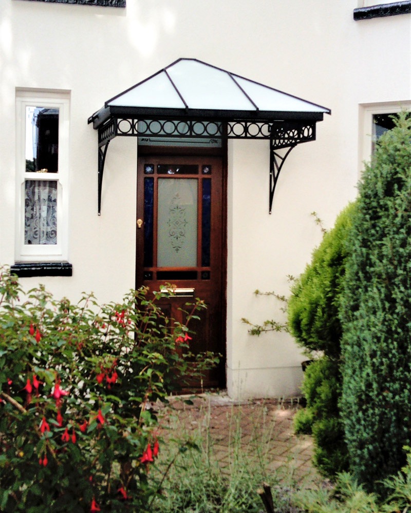 Glazed Wrought Iron Victorian style Ring Canopy with decorative spandrel brackets