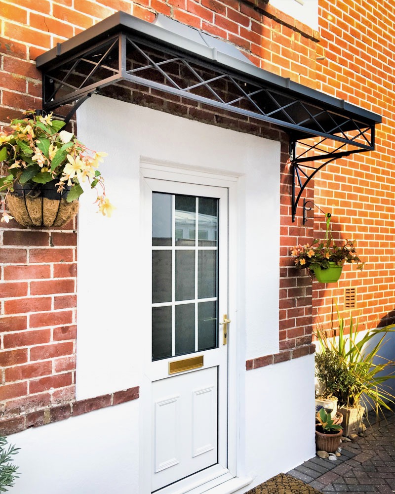 Double width Wrought Iron regency trellis style front door Canopy with Zinc Canopy Roof and sunray sprandrels