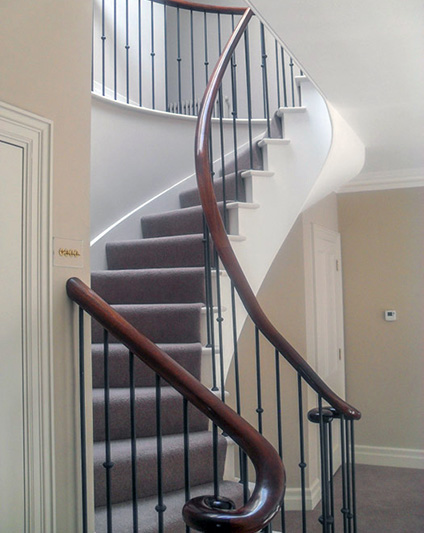 Forged Iron Balustrade with Walnut Handrail